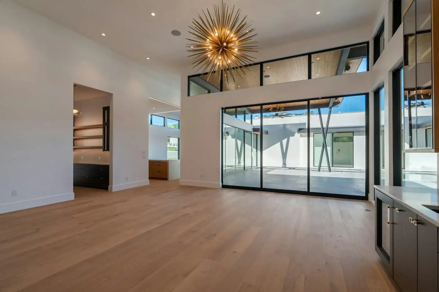 Slim aluminium sliding doors fully open to the patio