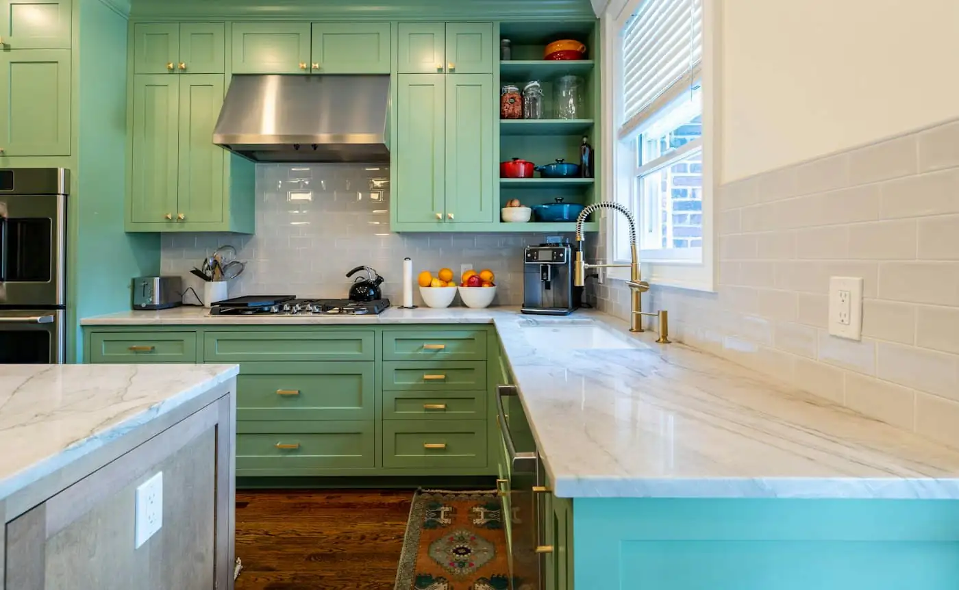 New kitchen inside the extension with dark green cabinets